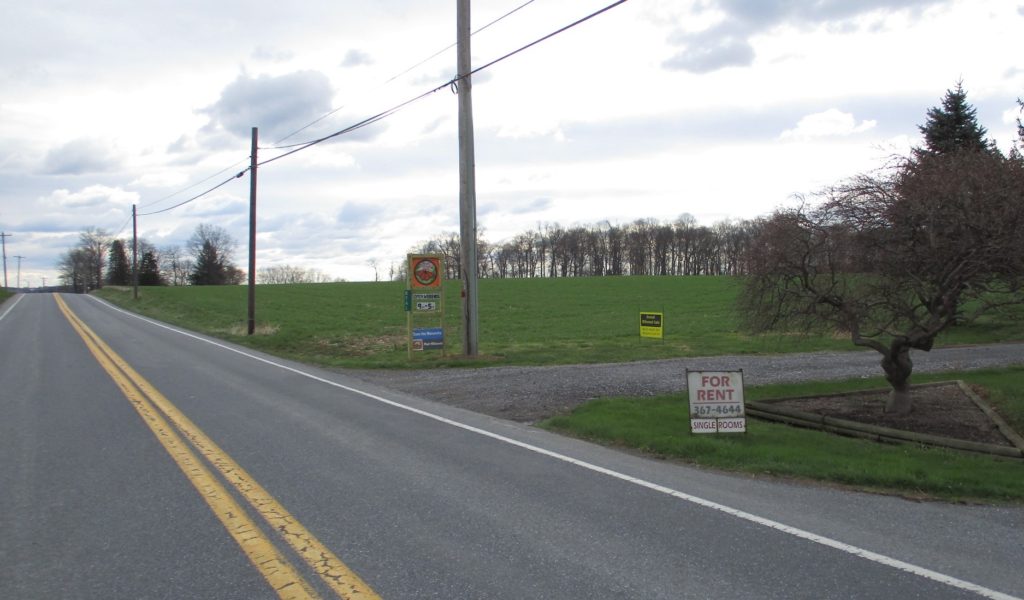 Road sign driving East