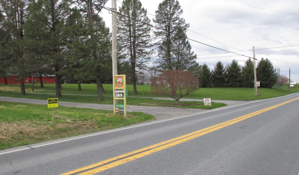 Road sign going West